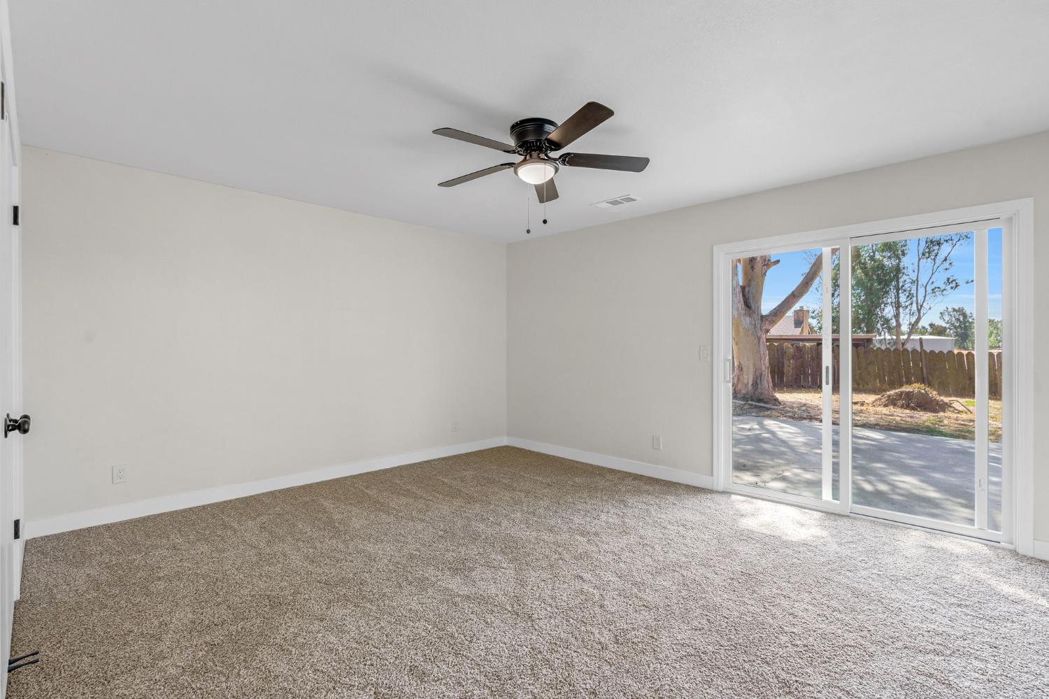 16860 Mark Road Madera, CA 93636 - Photo 26 of 44 a view of an empty room with a window