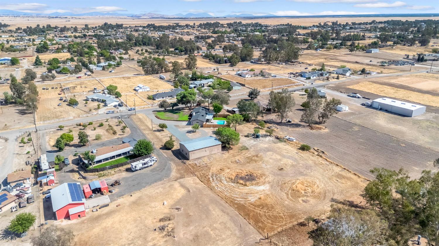 16860 Mark Road Madera, CA 93636 - Photo 38 of 44 an aerial view of a city