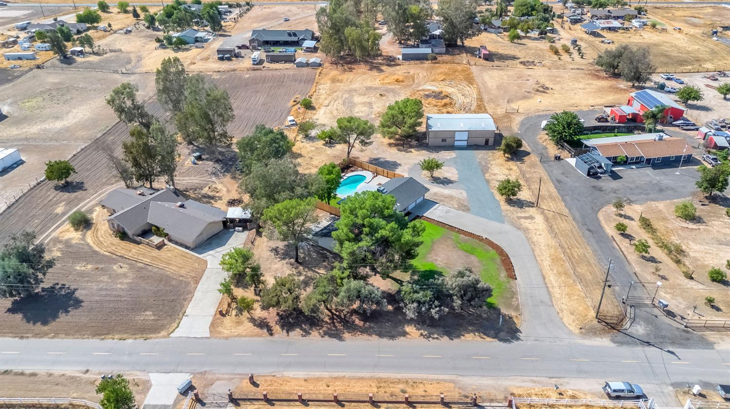 16860 Mark Road Madera, CA 93636 - Photo 43 of 44 an aerial view of residential houses with outdoor space