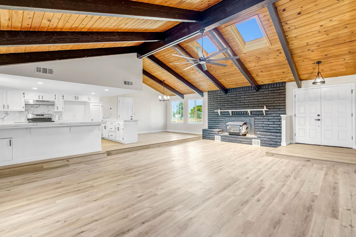 16860 Mark Road Madera, CA 93636 - Photo 8 of 44 a view of a kitchen with a sink and cabinets