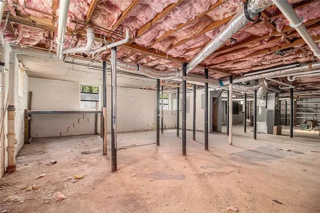 a view of a room with wooden walls