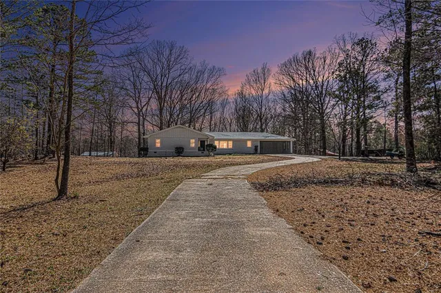 a house with trees in front of it
