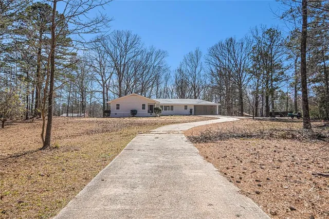 a house with trees in front of it