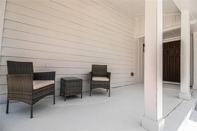 a view of a livingroom with furniture and a couch