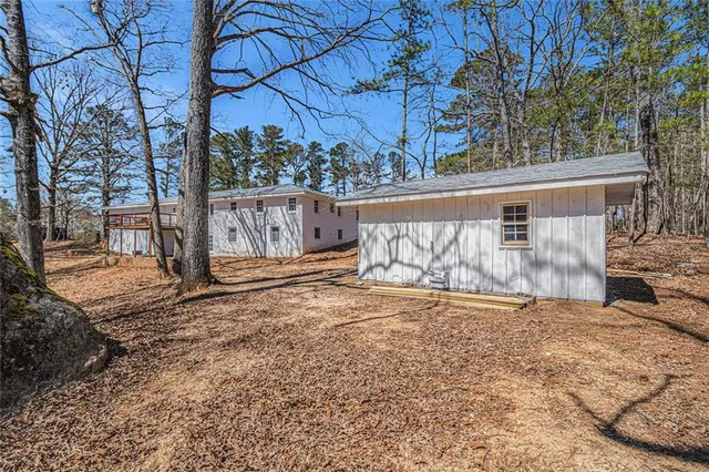 a view of a backyard of the house