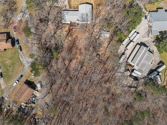 an aerial view of residential house with outdoor space