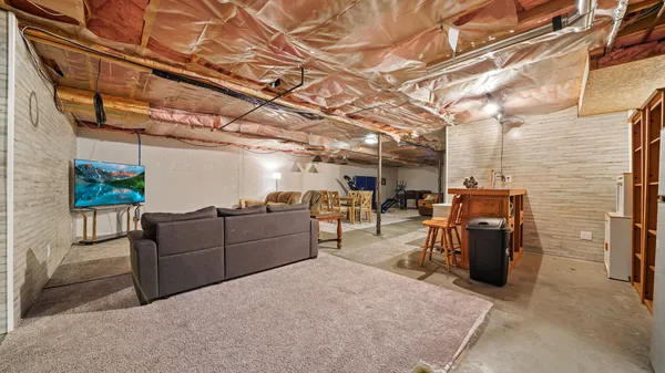 a view of a storage room with furniture