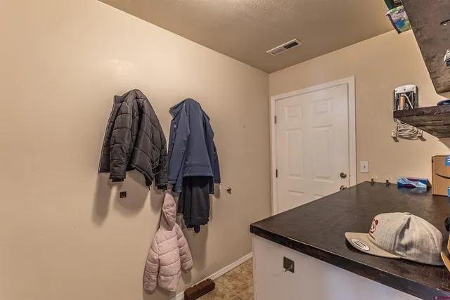 a view of towel hanging in closet