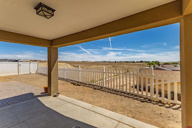 a view of a balcony with ocean view
