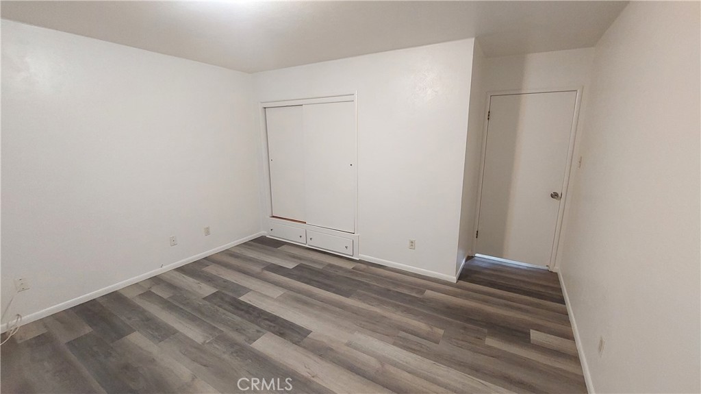 1909 Colusa Street Corning, CA 96021 - Photo 14 of 22 a view of a room with wooden floor