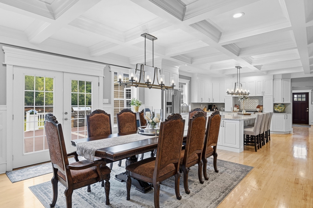 35 High Street Freetown, MA 02702 - Photo 23 of 40 a dining room with furniture a chandelier and wooden floor