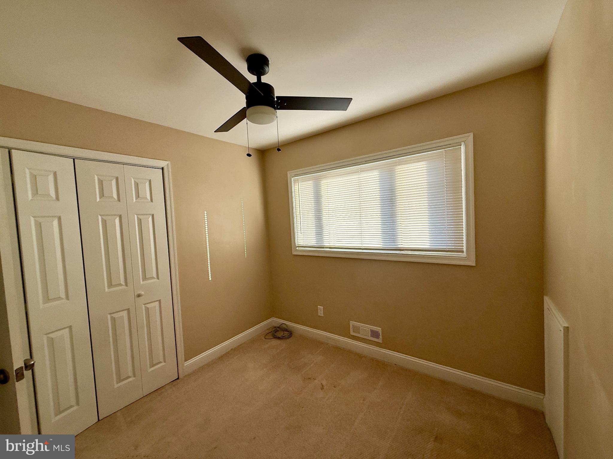 900 Southridge Road Catonsville, MD 21228 - Photo 17 of 31 a view of an empty room with a window