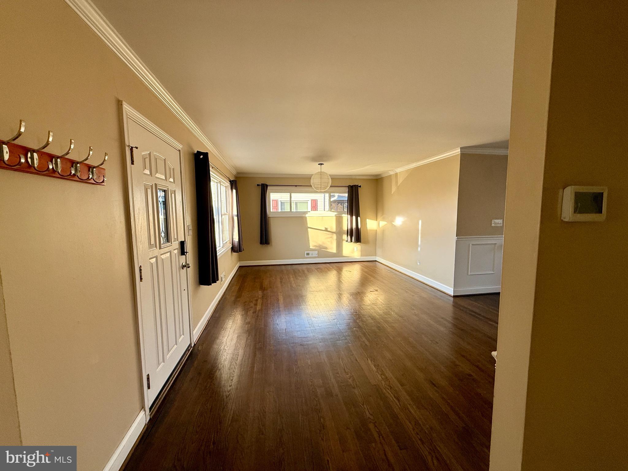 900 Southridge Road Catonsville, MD 21228 - Photo 2 of 31 a view of a hallway with wooden floor