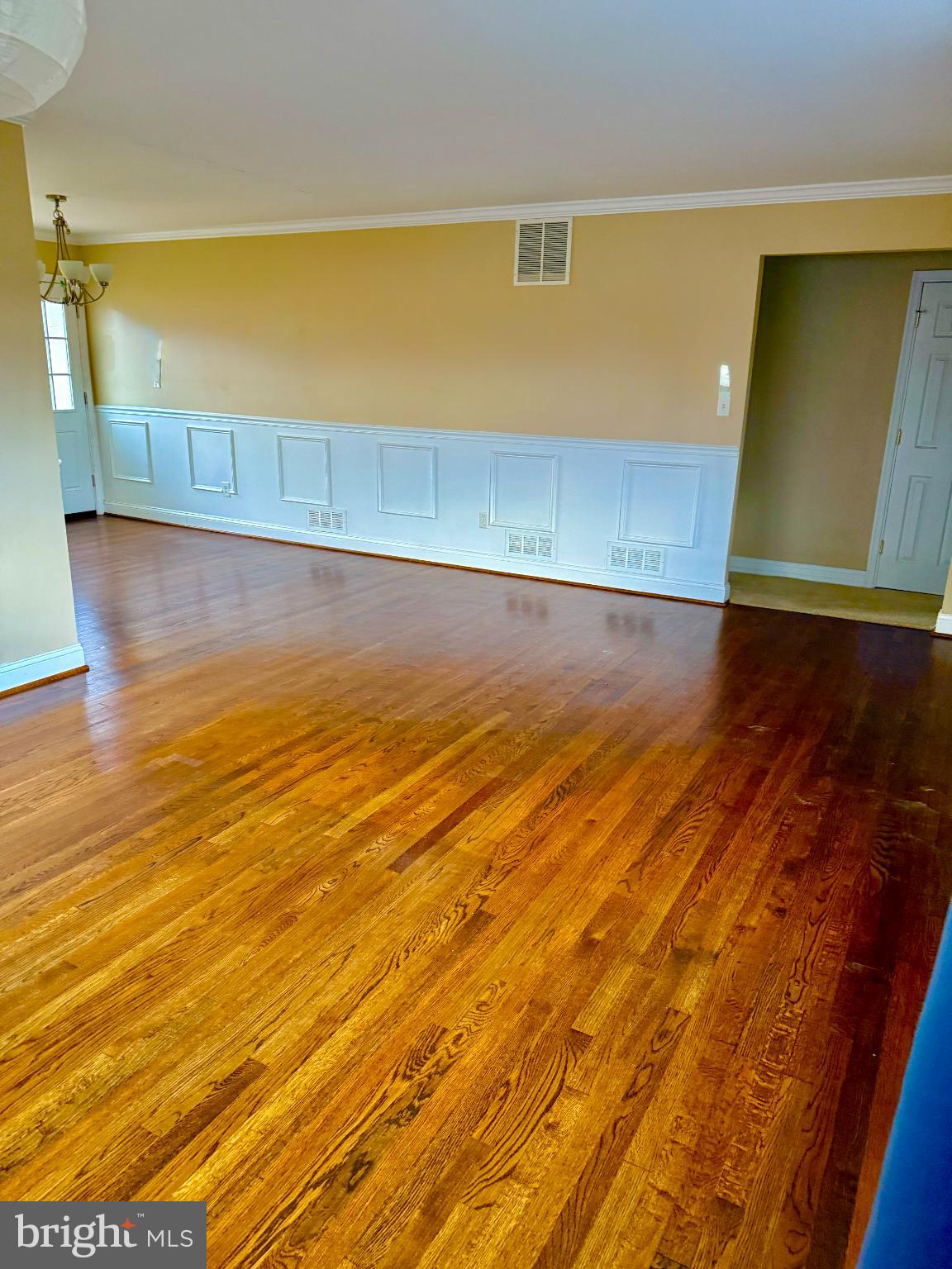 900 Southridge Road Catonsville, MD 21228 - Photo 6 of 31 a view of an empty room with wooden floor