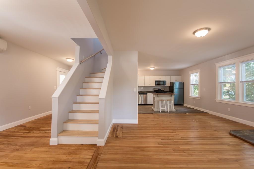 1570 County Street Somerset, MA 02726 - Photo 3 of 21 a view of kitchen with furniture and wooden floor