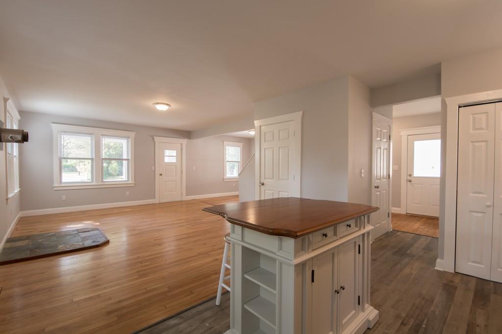 1570 County Street Somerset, MA 02726 - Photo 8 of 21 a kitchen with a sink and wooden floor