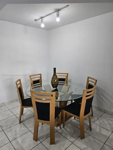 a view of a workspace with furniture