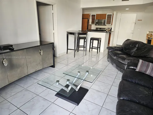 a close view of a stove top oven and cabinets