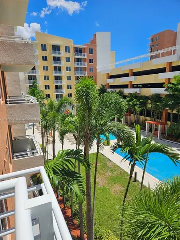 a view of building with yard