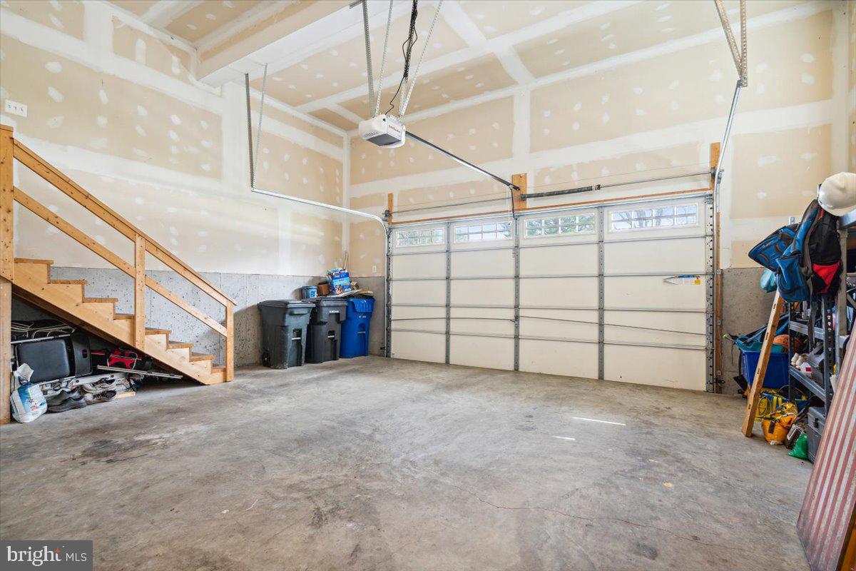 7024 Fox Chase Road New Market, MD 21774 - Photo 31 of 57 2 car garage with elevated ceilings