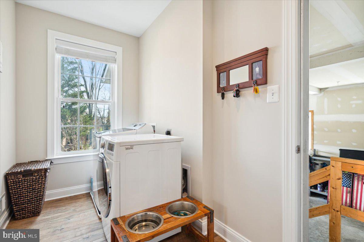 7024 Fox Chase Road New Market, MD 21774 - Photo 6 of 57 Bright and light laundry room.
