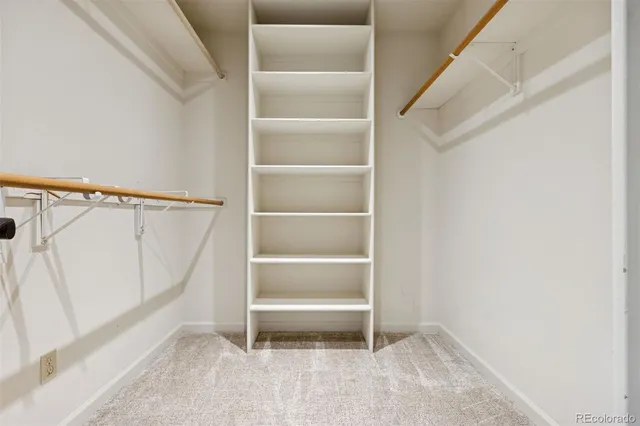 a view of an empty walk in closet