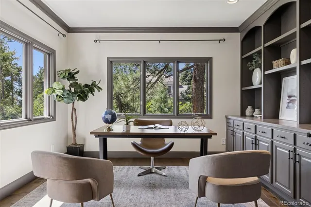 a view of a dining room with furniture window and outside view
