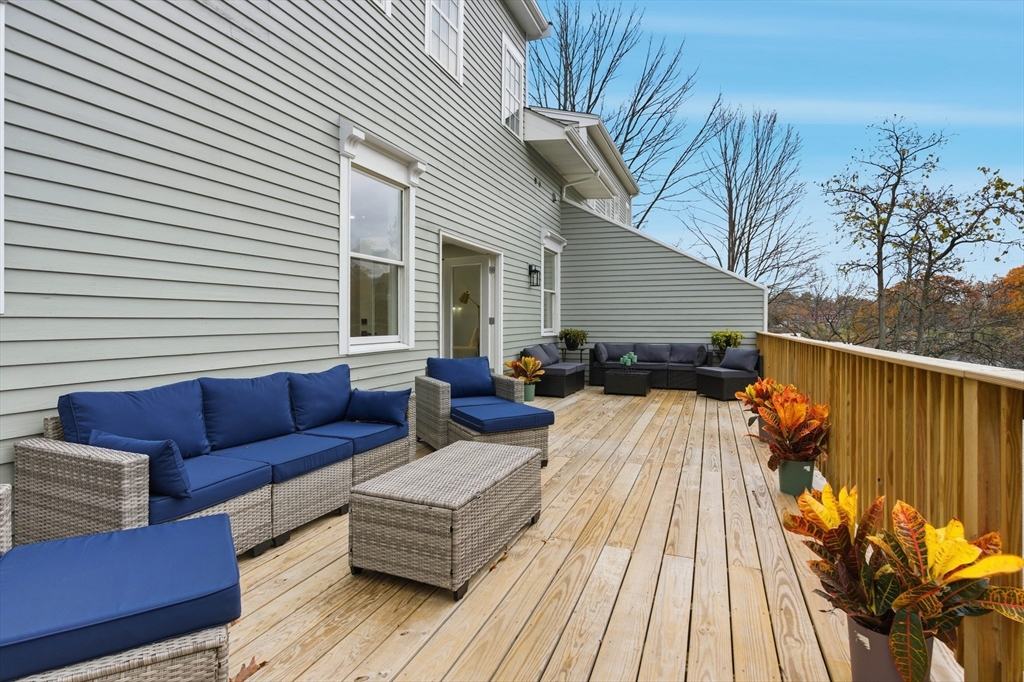 288 Grove Street, Unit 288 Clinton, MA 01510 - Photo 30 of 40 a balcony view with a seating space