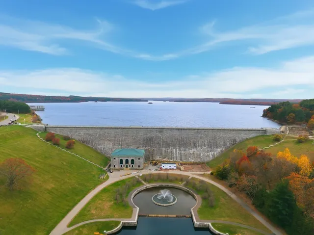 an aerial view of a house with a swimming pool