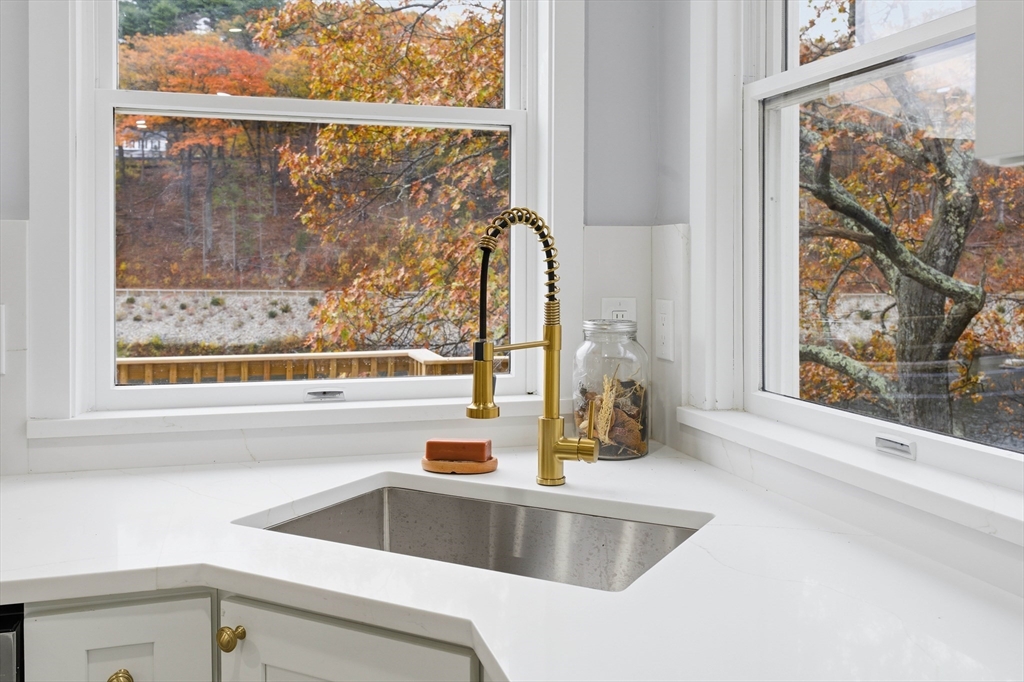 288 Grove Street, Unit 288 Clinton, MA 01510 - Photo 10 of 40 a kitchen with a sink and large window