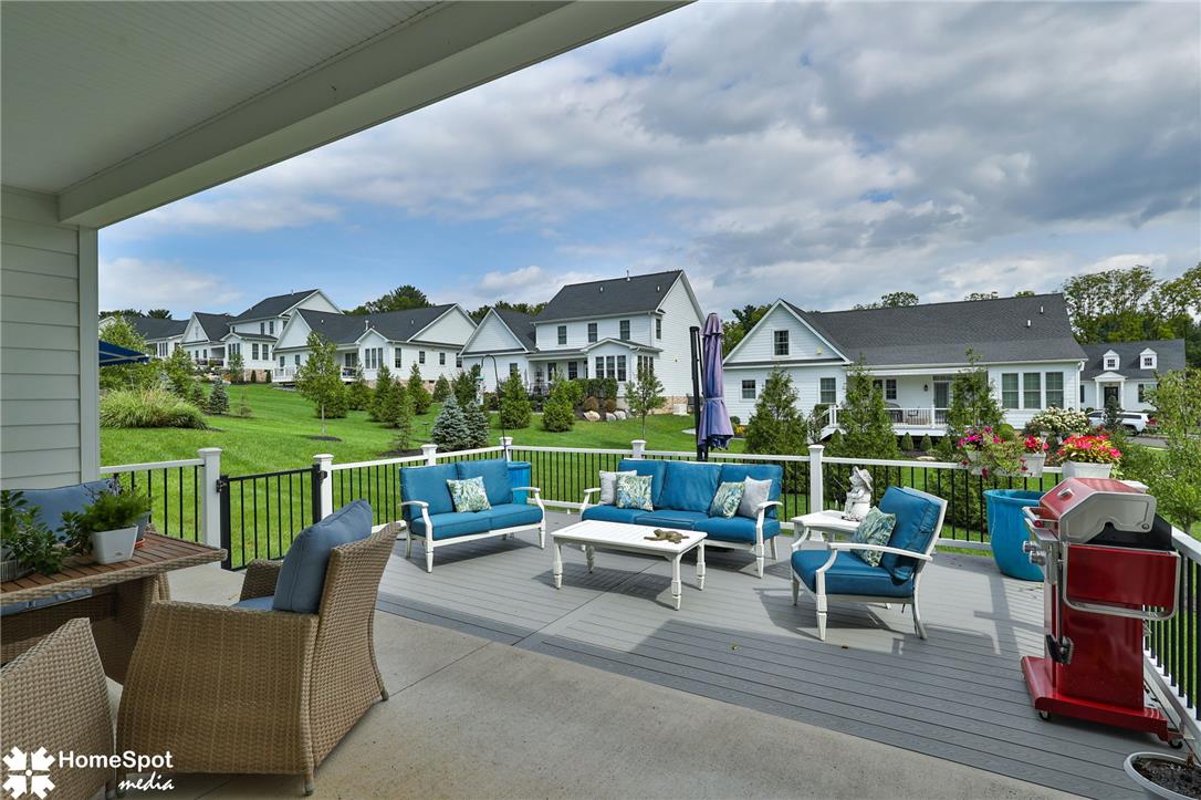 4473 Old Saucon Road Bethlehem, PA 18015 - Photo 23 of 26 A spacious elevated deck overlooks the rolling green lawns of a quiet suburban neighborhood.