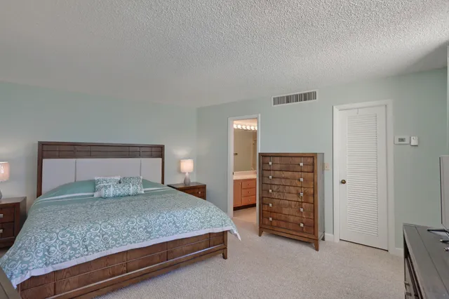a bathroom with a sink double vanity and a shower