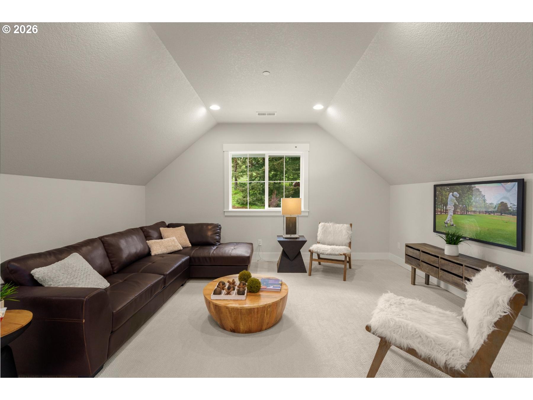 28410 Northeast Bell Road Newberg, OR 97132 - Photo 19 of 27 a living room with furniture and a flat screen tv