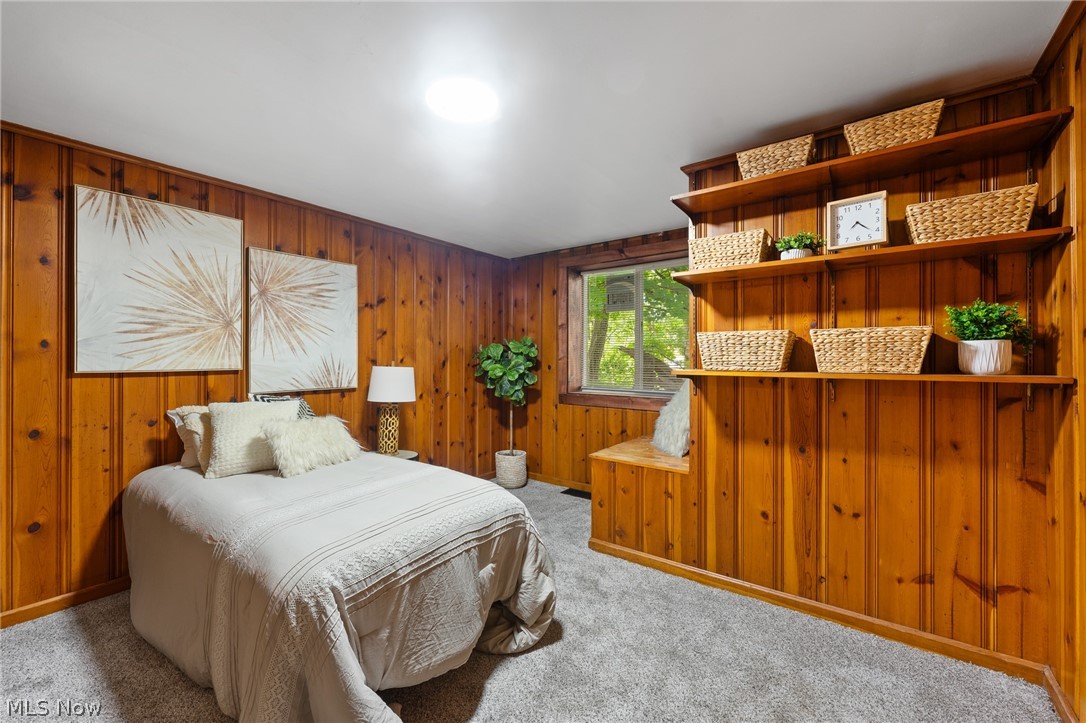 3568 McCartney Road Youngstown, OH 44505 - Photo 24 of 29 Carpeted bedroom with wooden walls