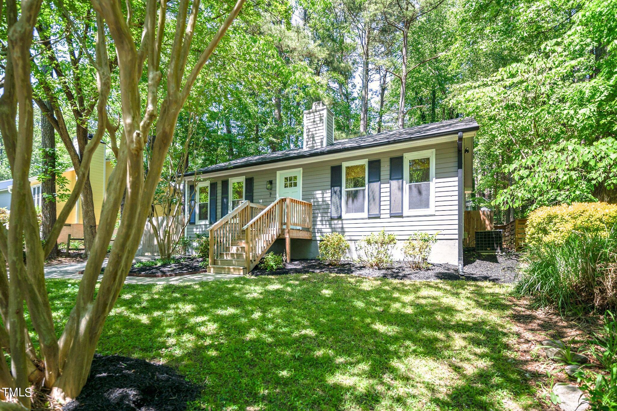 7 Little Spring Lane Durham, NC 27707 - Photo 2 of 25 a view of a house with backyard