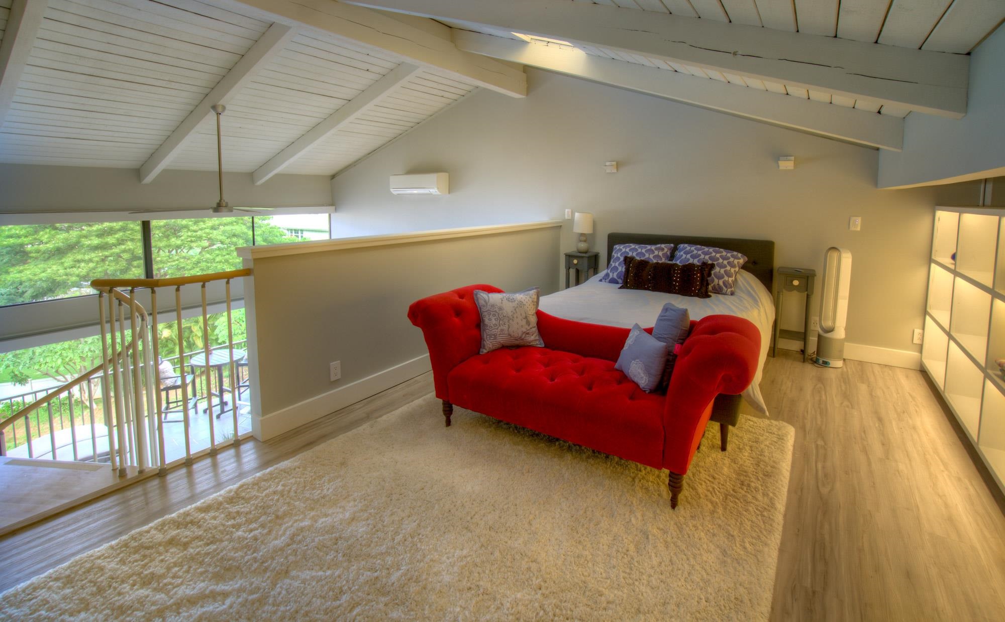 2387 South Kihei Road, Unit A403 Kihei, HI 96753 - Photo 11 of 19 a bedroom with furniture and a wooden floor