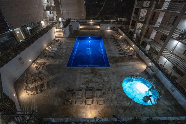 a kitchen with table and chairs