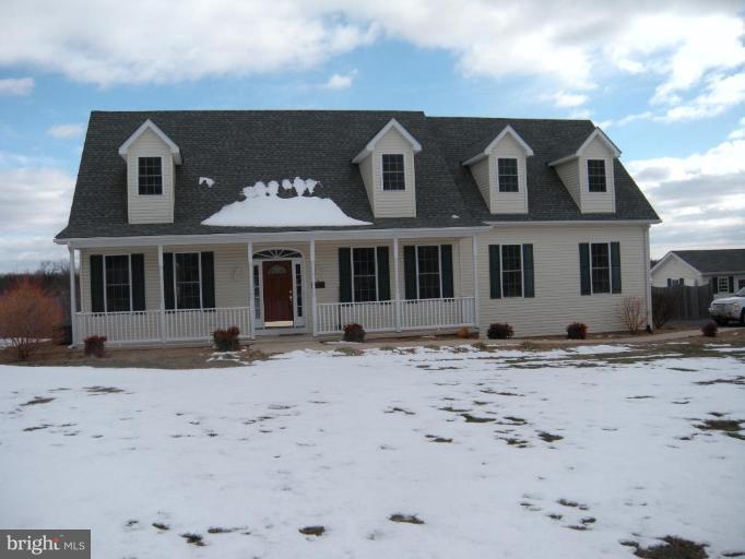 814 Payne Road Winchester, VA 22603 - Photo 1 of 1 a front view of a house with a dirt yard