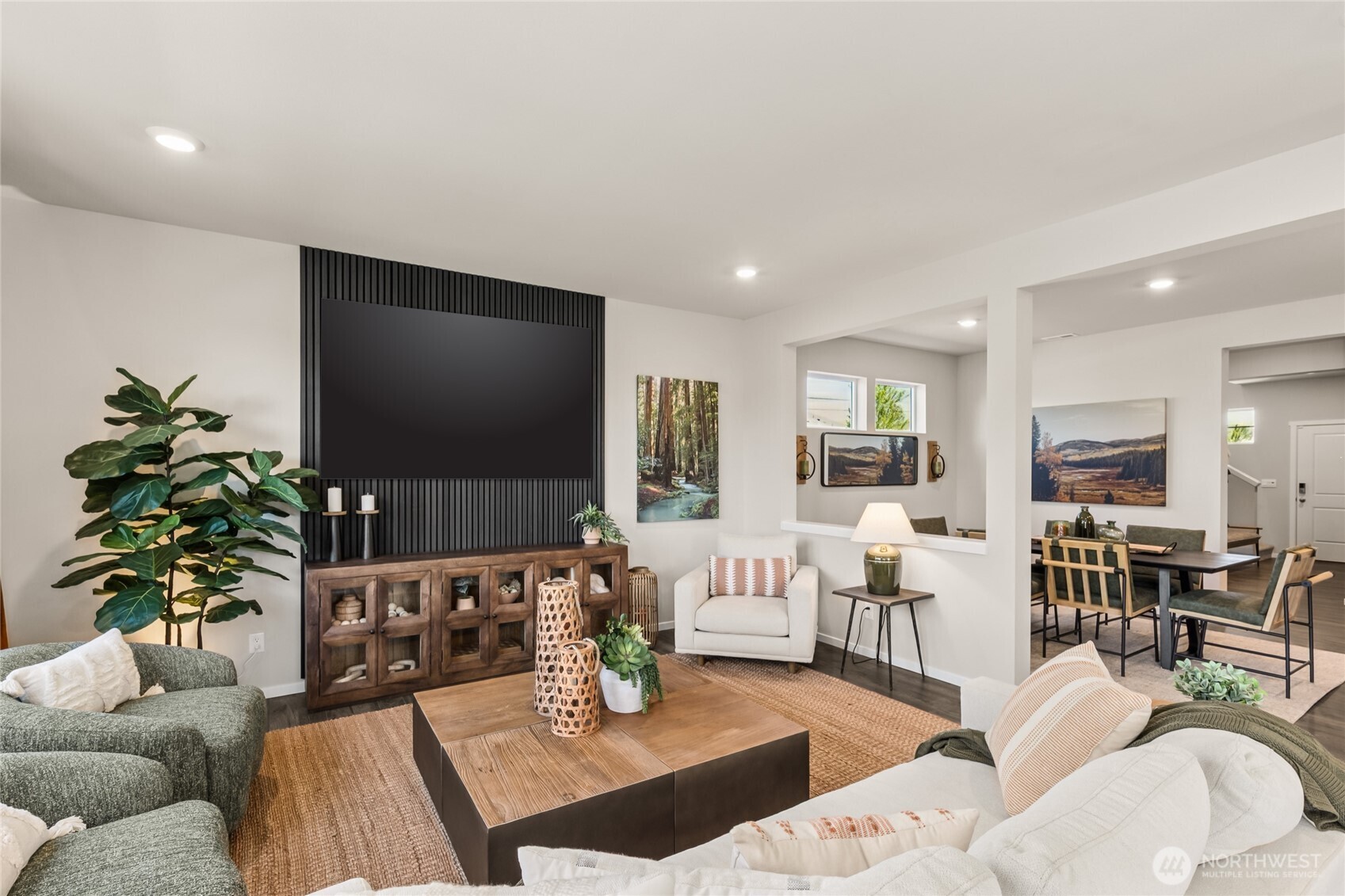 550 Hann Street, Unit 63 Buckley, WA 98321 - Photo 18 of 30 a living room with furniture a flat screen tv and a potted plant