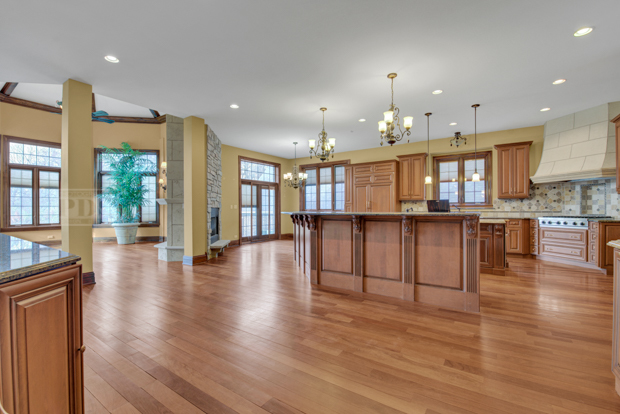 38W340 Henricksen Road St. Charles, IL 60175 - Photo 19 of 54 an open kitchen with kitchen island and stainless steel appliances
