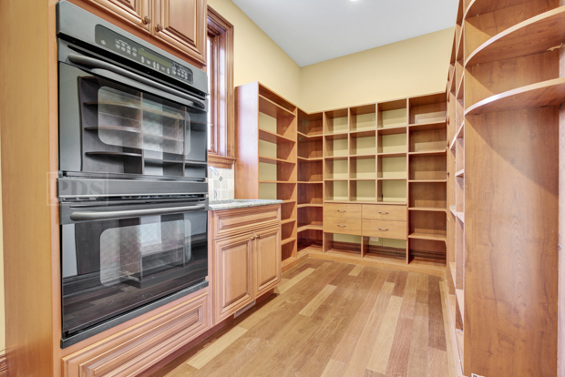 38W340 Henricksen Road St. Charles, IL 60175 - Photo 32 of 54 a kitchen with granite countertop a stove and a cabinet
