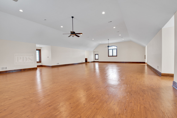 38W340 Henricksen Road St. Charles, IL 60175 - Photo 34 of 54 a view of an empty room with wooden floor and a window