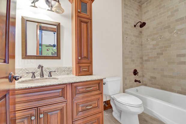 38W340 Henricksen Road St. Charles, IL 60175 - Photo 42 of 54 a bathroom with a sink a toilet and shower
