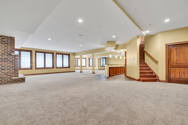 38W340 Henricksen Road St. Charles, IL 60175 - Photo 45 of 54 a view of an empty room with a fireplace
