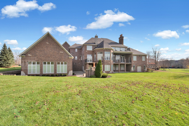 38W340 Henricksen Road St. Charles, IL 60175 - Photo 52 of 54 a front view of a house with a garden