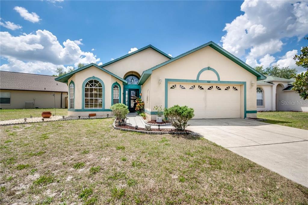 1601 Riveredge Road Oviedo, FL 32766 - Photo 1 of 1 a view of front of a house with a yard