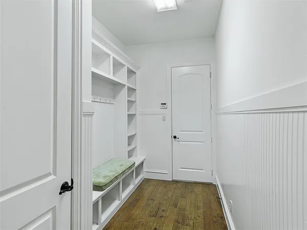 a bathroom with a tub and shower