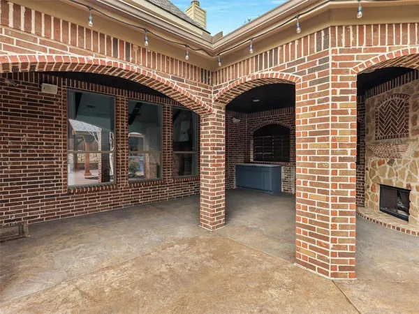 a view of a house with a door and a balcony