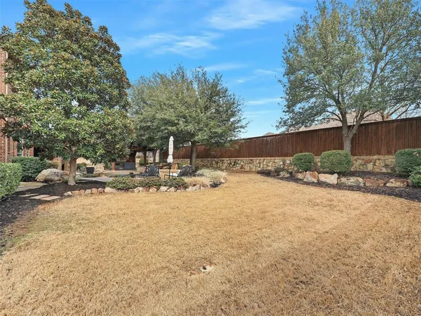 a view of swimming pool with a yard