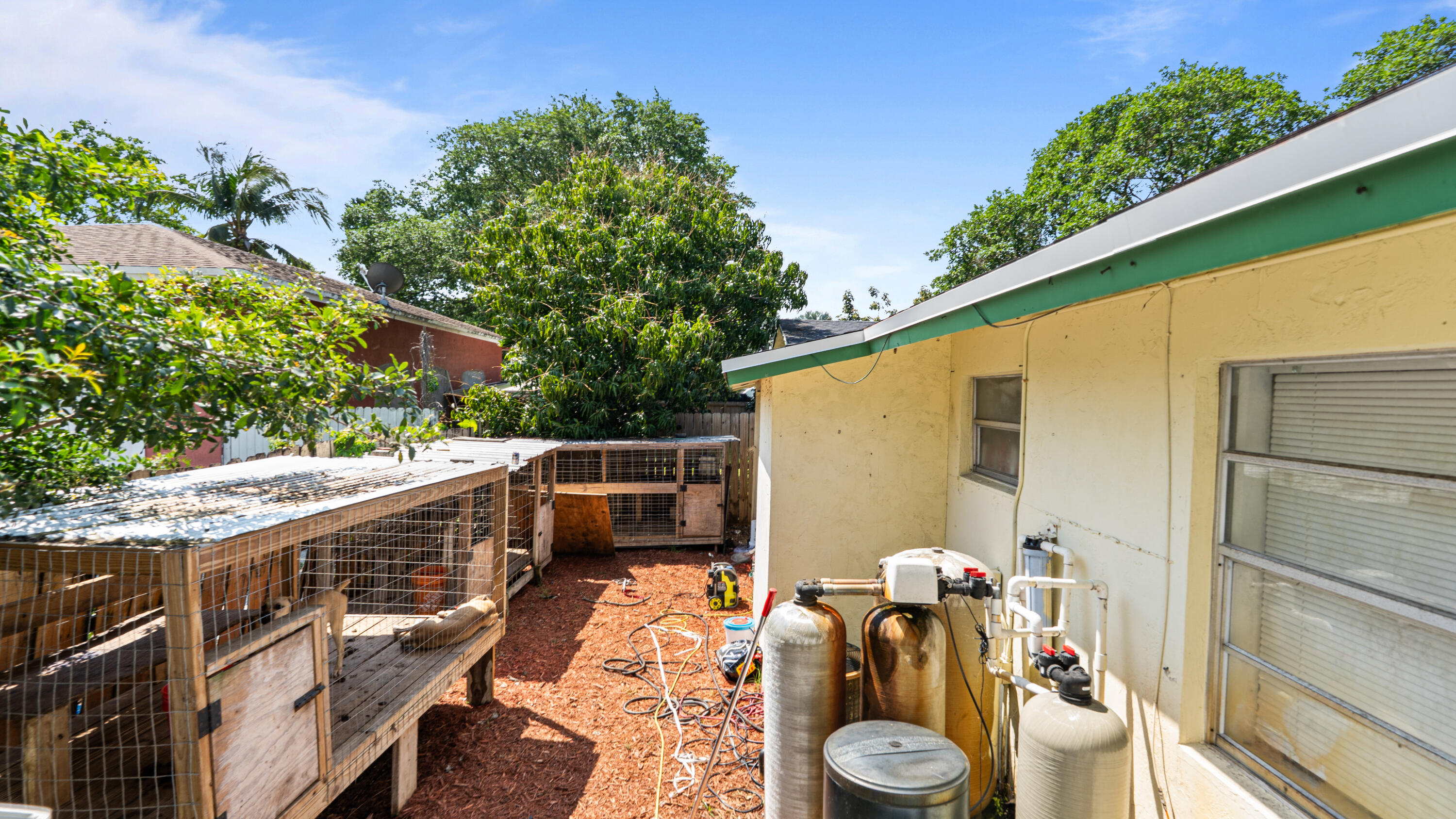 4453 Stevens Road Lake Worth Beach, FL 33461 - Photo 62 of 67 a view of a patio with furniture